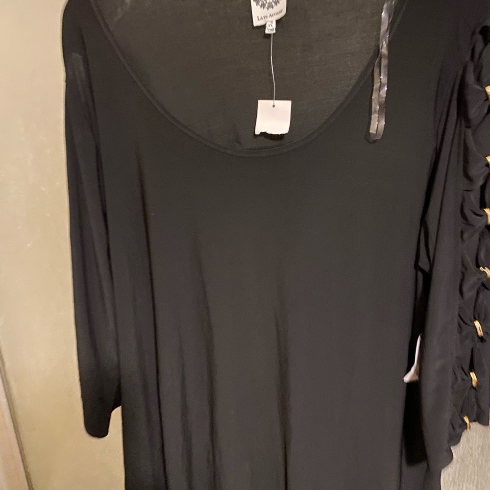 Late August brand black top with black bows on the sleeve.